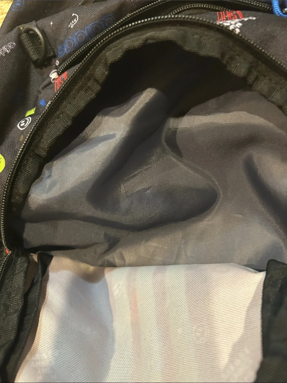 adidas Black Backpack with Bright Blue Stripes and Multicolor Icons